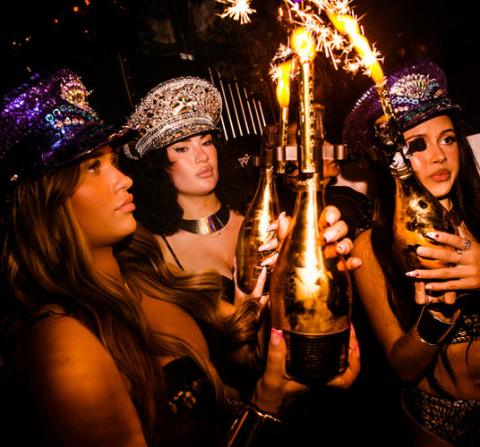 Bottle girls with champagne